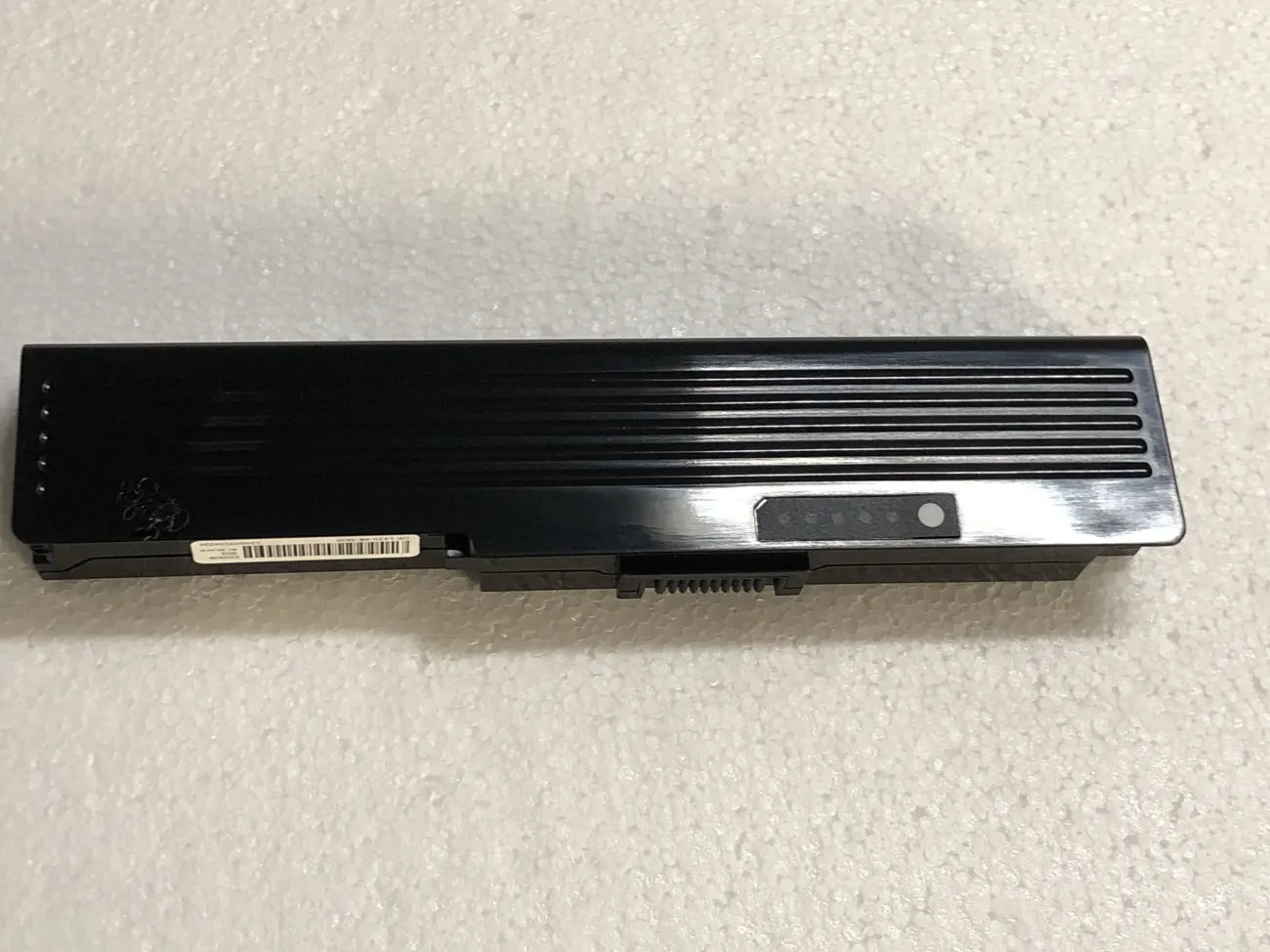 Pin Dell 1400 OEM mặt sau