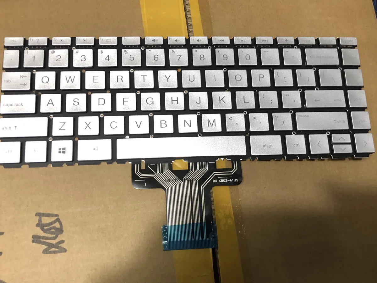 Bàn phím HP 14-DA000 (14-CE) BẠC =>HP 14-ce000, 14-cf000, 14s-cf000, 14-cr000, 14s-cr000, 14-ck000, 14-cm000, 14-da000, 14-df000, 14s-df000, 14-dh000, 14-dk000, 14s-dk000, 14-ma000, 14-dg000, 340s G7 mặt trước